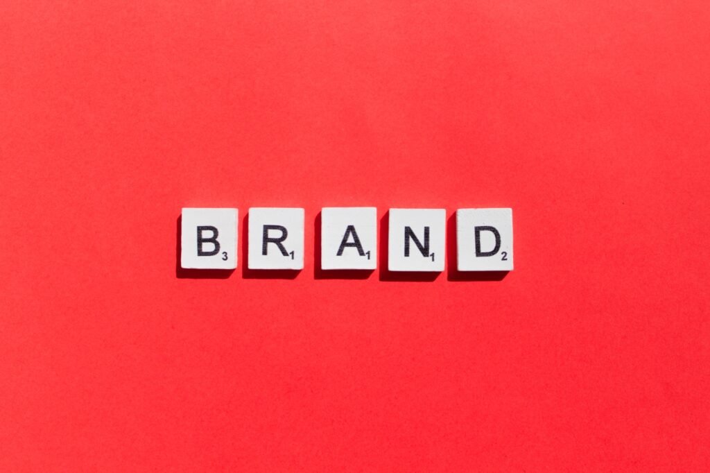 Brand scrabble letters word on a red background